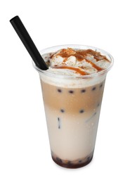 Photo of Tasty milk bubble tea in plastic cup isolated on white