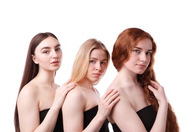 Photo of Beautiful women with different hair colors on white background
