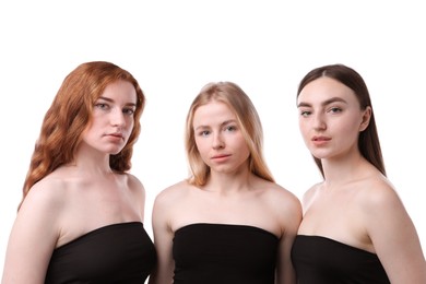 Photo of Beautiful women with different hair colors on white background