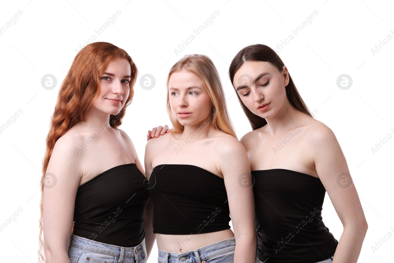 Beautiful women with different hair colors on white background Photo of Beautiful women with different hair colors on white background