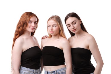 Photo of Beautiful women with different hair colors on white background
