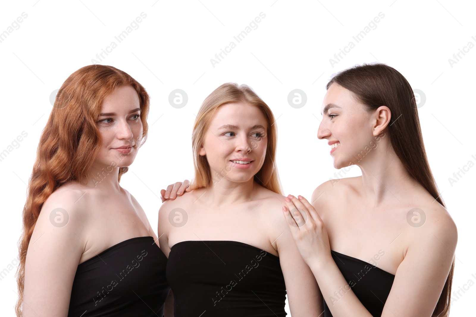 Beautiful women with different hair colors on white background Photo of Beautiful women with different hair colors on white background