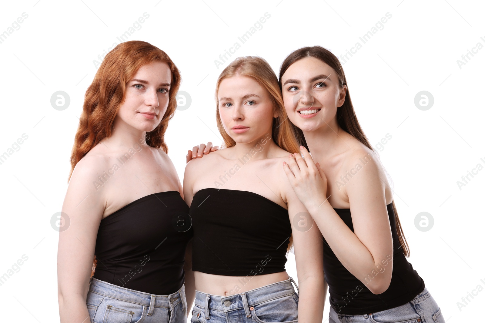 Beautiful women with different hair colors on white background Photo of Beautiful women with different hair colors on white background