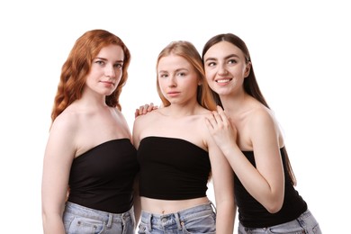 Photo of Beautiful women with different hair colors on white background