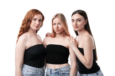 Photo of Beautiful women with different hair colors on white background