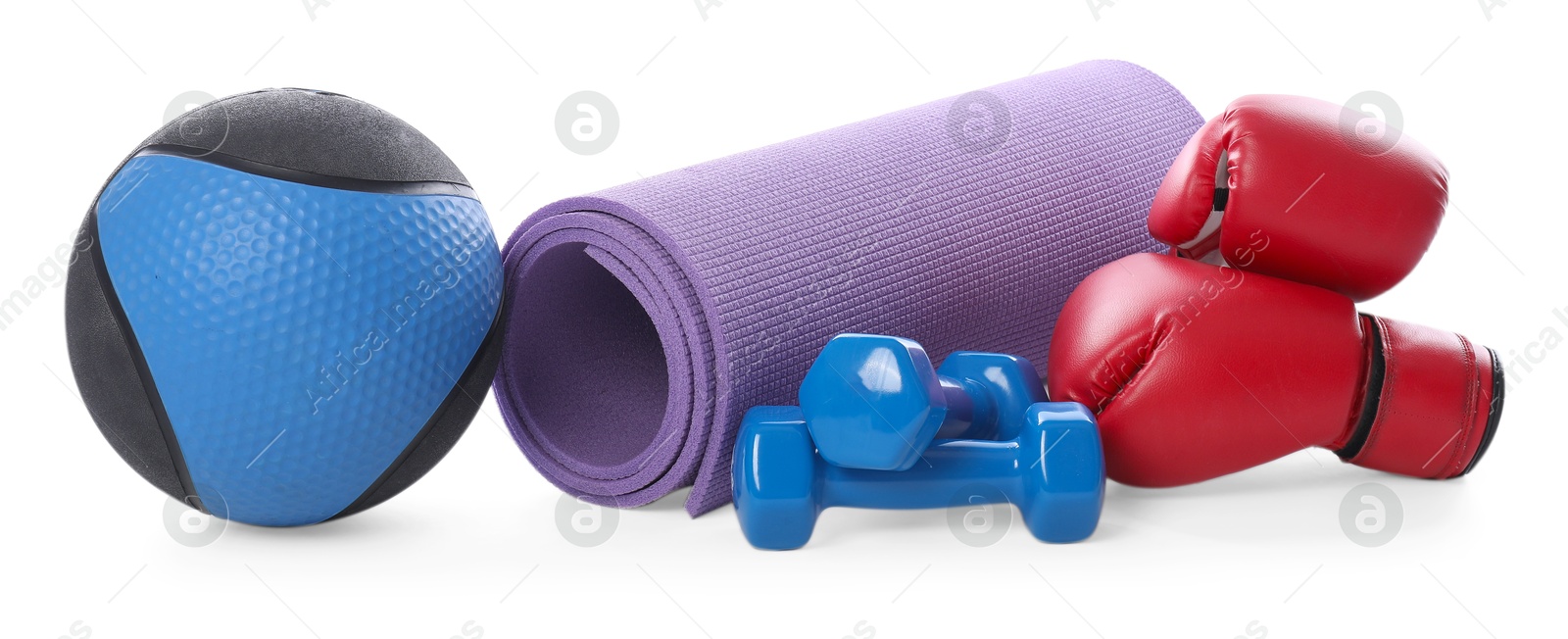 Medicine ball, dumbbells, boxing gloves and fitness mat isolated on white Photo of Medicine ball, dumbbells, boxing gloves and fitness mat isolated on white