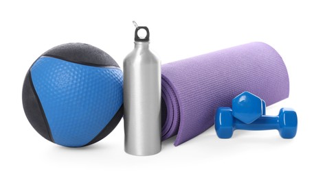Photo of Medicine ball, dumbbells, water bottle and fitness mat isolated on white