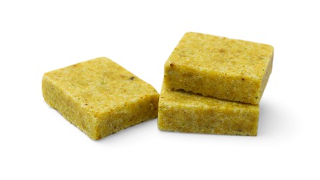 Photo of Tasty aromatic bouillon cubes isolated on white