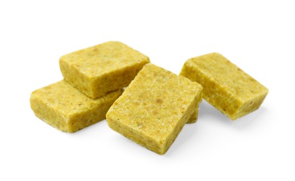 Photo of Tasty aromatic bouillon cubes isolated on white