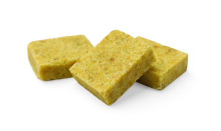 Photo of Tasty aromatic bouillon cubes isolated on white