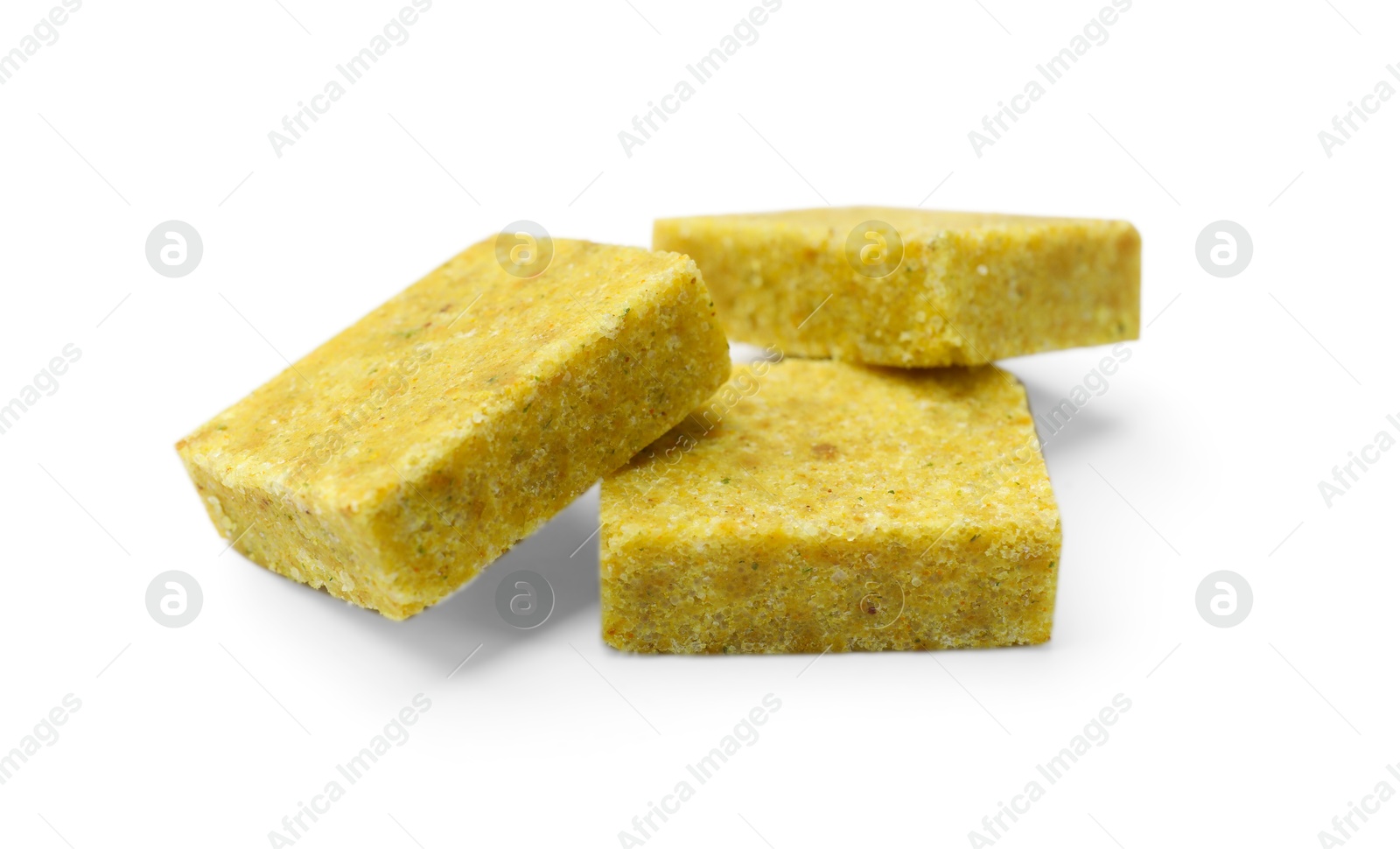 Tasty aromatic bouillon cubes isolated on white Photo of Tasty aromatic bouillon cubes isolated on white