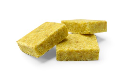 Photo of Tasty aromatic bouillon cubes isolated on white