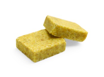 Photo of Tasty aromatic bouillon cubes isolated on white