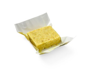 Photo of Tasty aromatic bouillon cube in wrap isolated on white