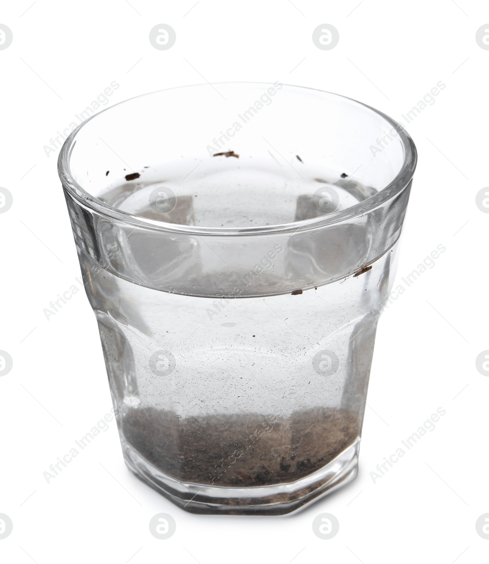Glass with dirty water isolated on white Photo of Glass with dirty water isolated on white