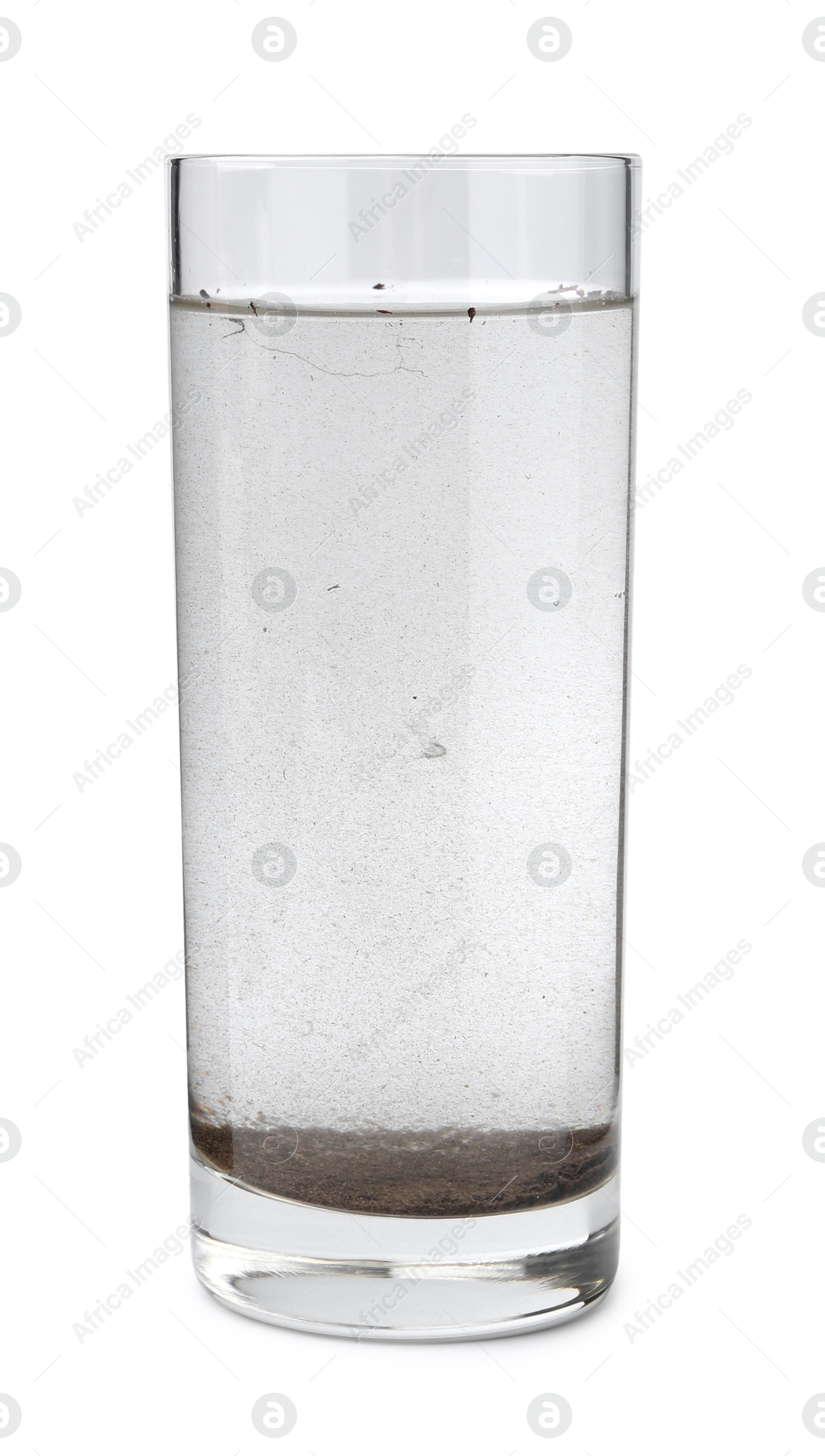 Glass with dirty water isolated on white Photo of Glass with dirty water isolated on white