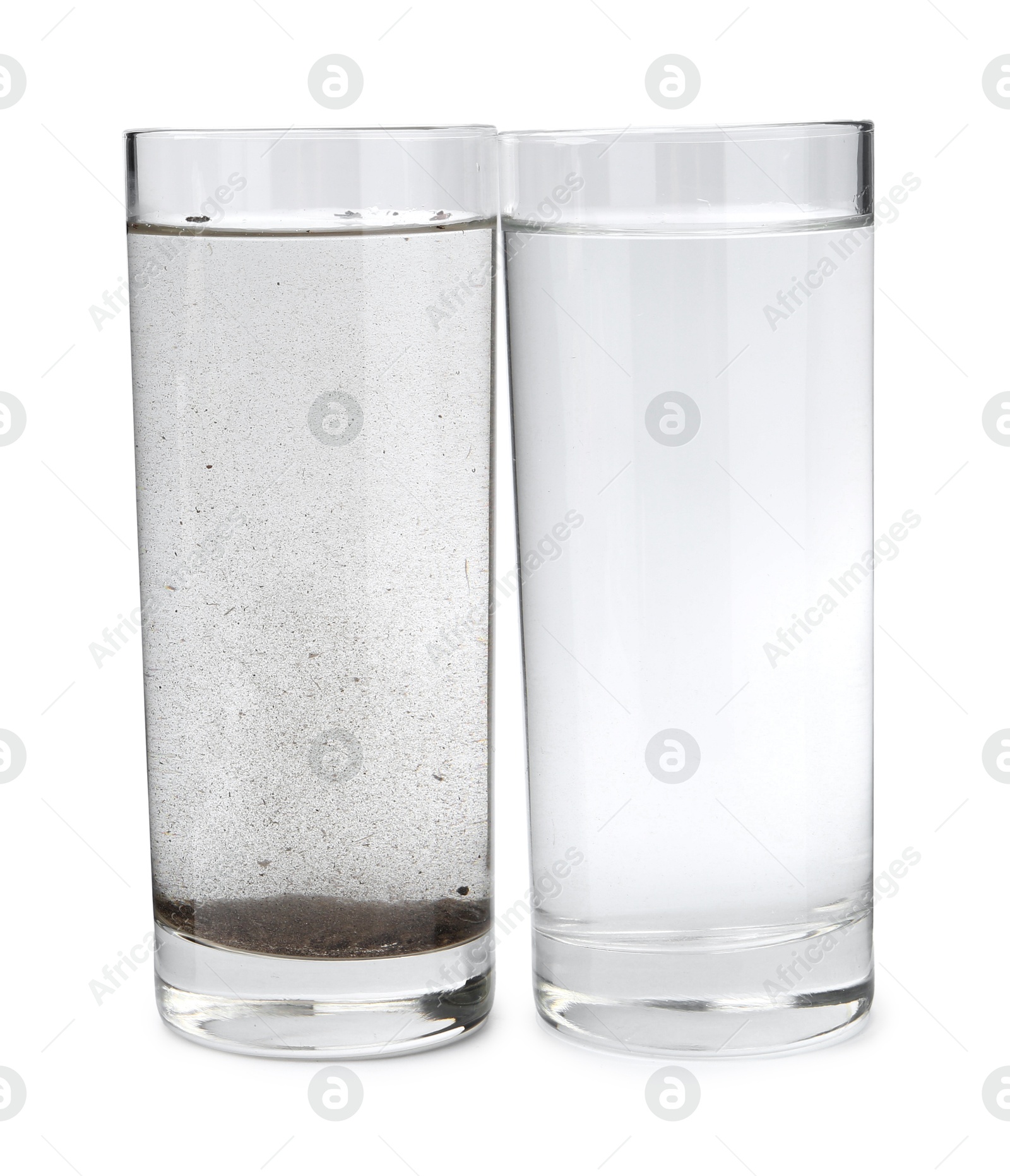 Photo of Glasses with clean and dirty water isolated on white