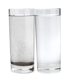 Photo of Glasses with clean and dirty water isolated on white