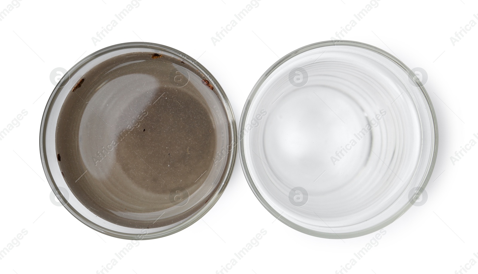 Glasses with clean and dirty water isolated on white, top view Photo of Glasses with clean and dirty water isolated on white, top view