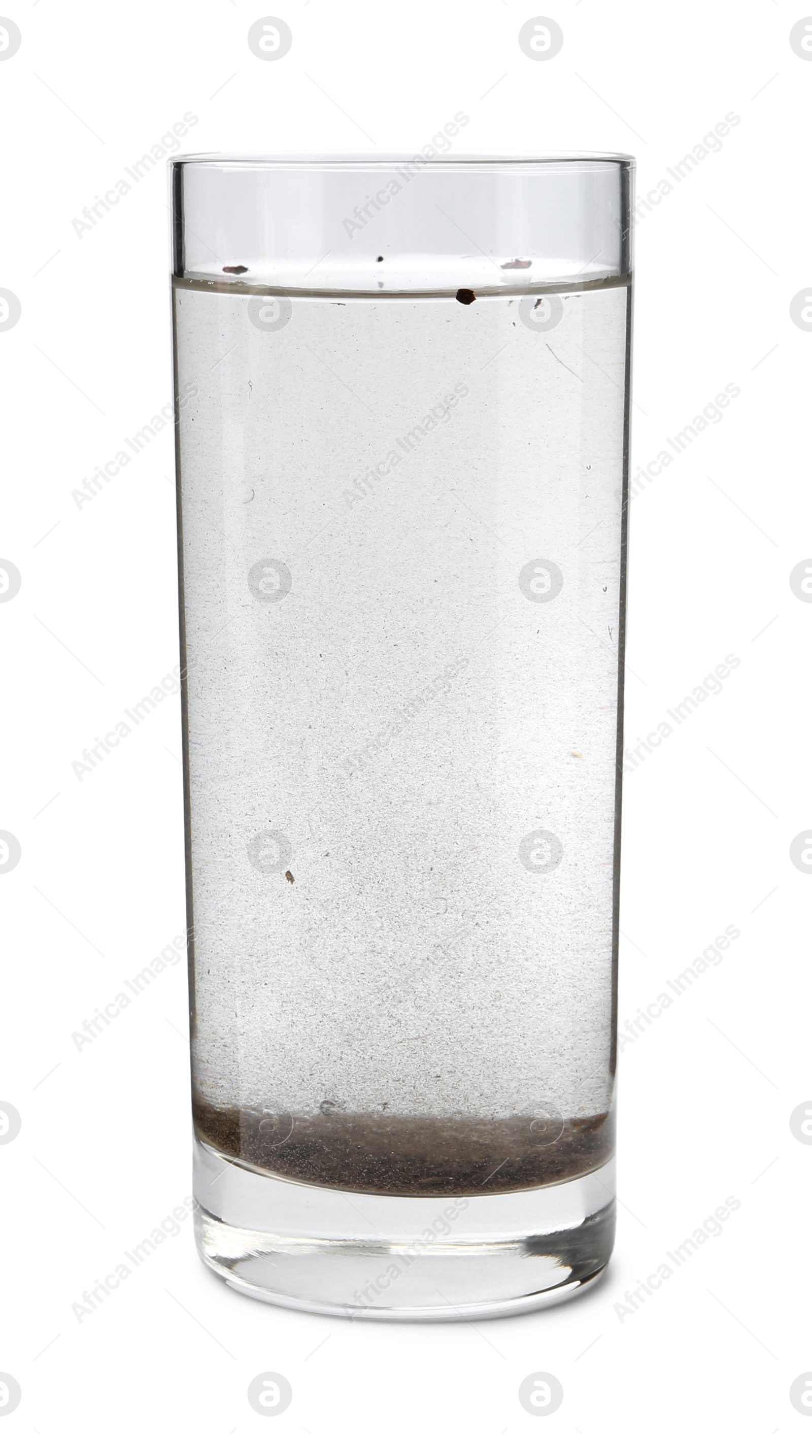 Glass with dirty water isolated on white Photo of Glass with dirty water isolated on white