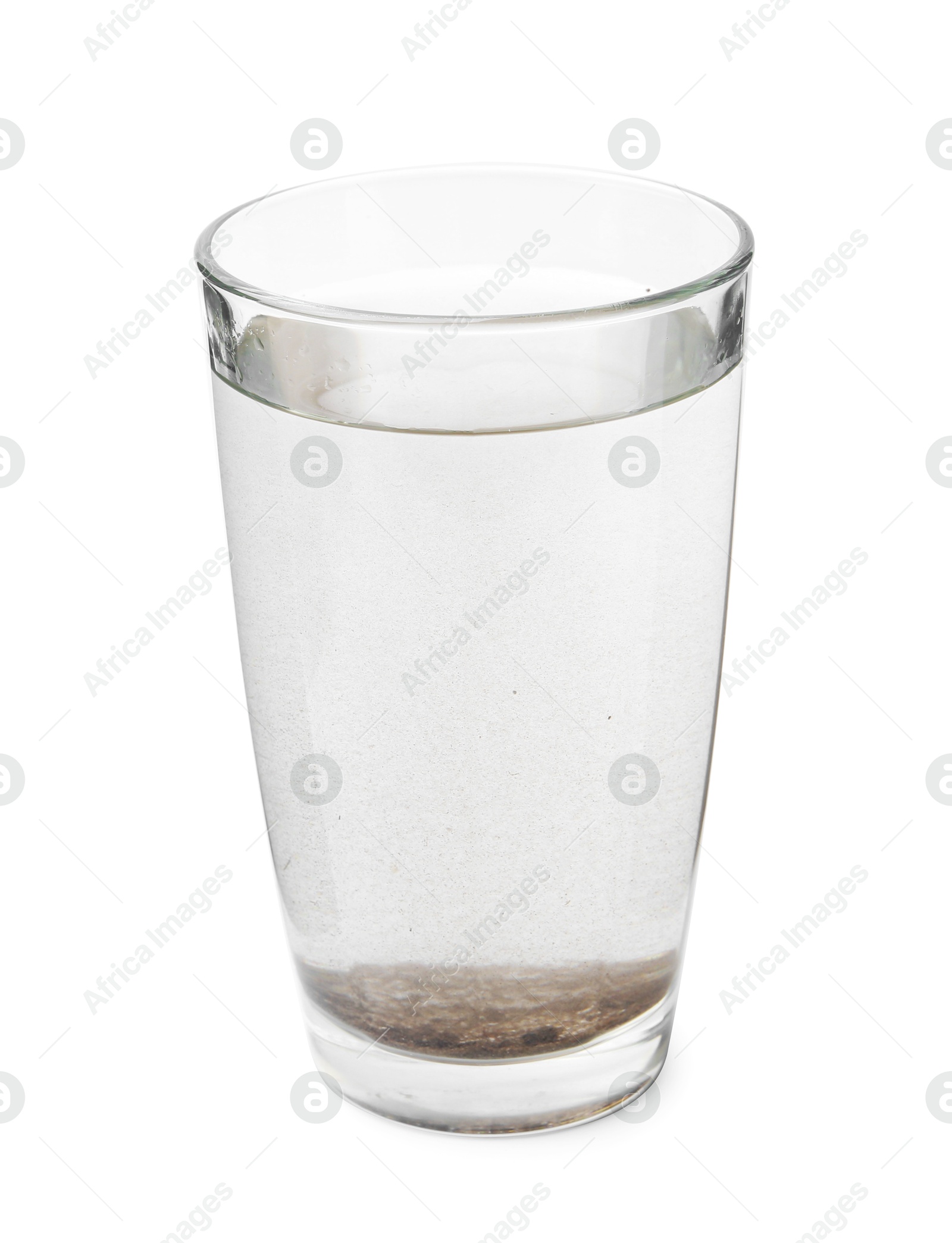 Glass with dirty water isolated on white Photo of Glass with dirty water isolated on white