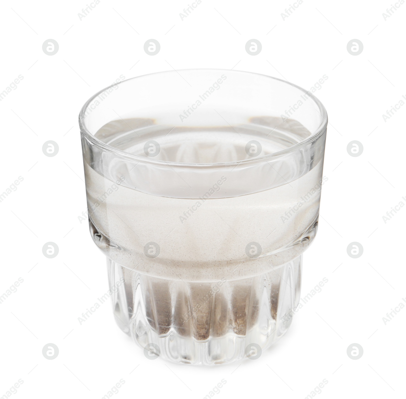 Glass with dirty water isolated on white Photo of Glass with dirty water isolated on white