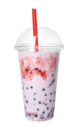 Photo of Tasty milk bubble tea in plastic cup isolated on white