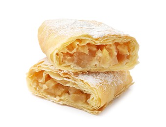 Photo of Pieces of tasty apple strudel with powdered sugar isolated on white