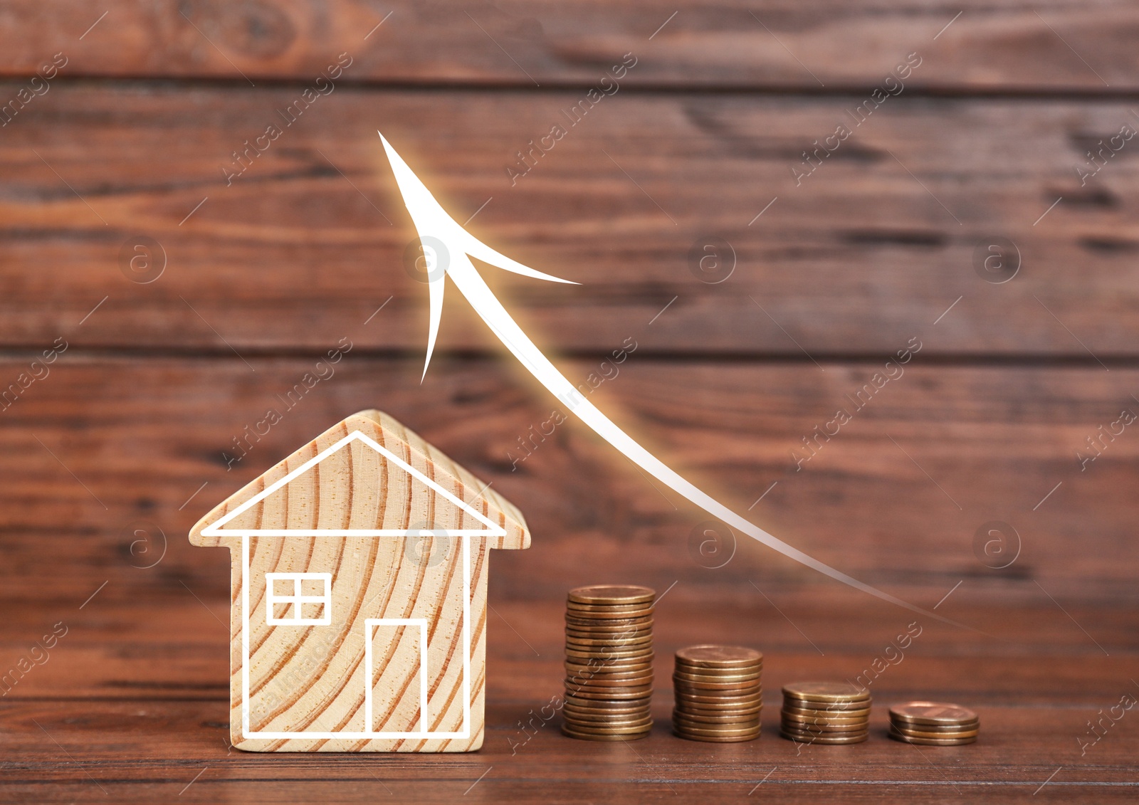 Increase in real estate value. House model and coins on table. Growing price represented by arrow Image of Increase in real estate value. House model and coins on table. Growing price represented by arrow