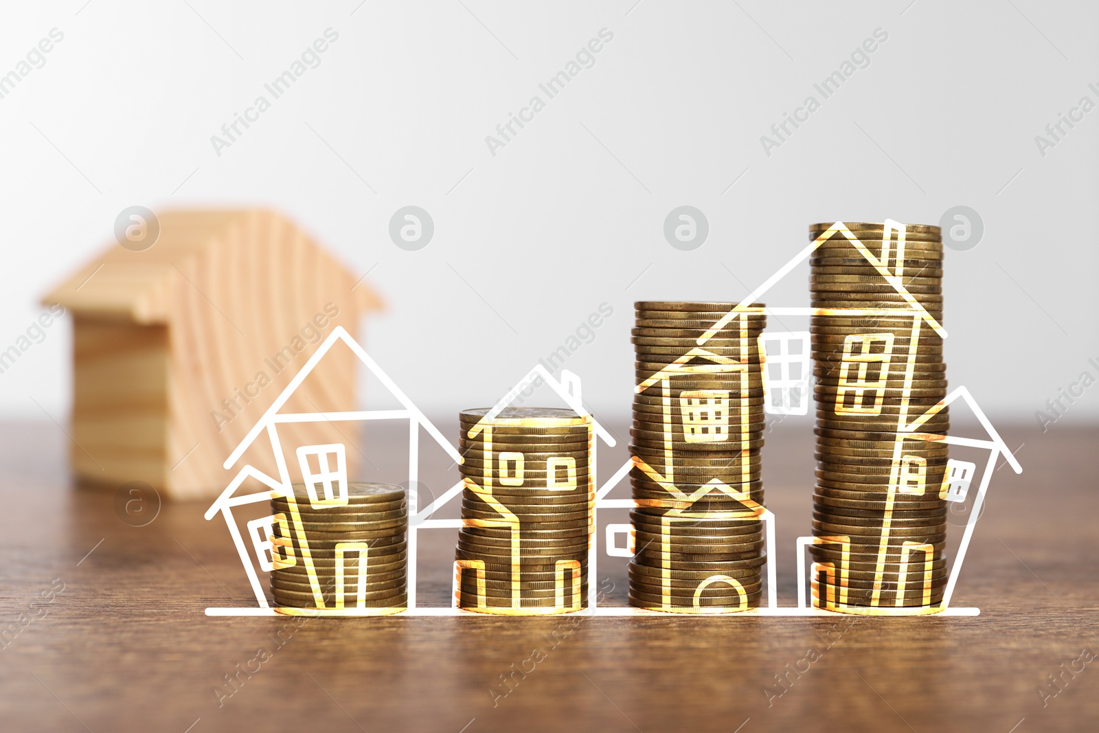 Increase in real estate value. Stacked coins and illustration of house on table Image of Increase in real estate value. Stacked coins and illustration of house on table