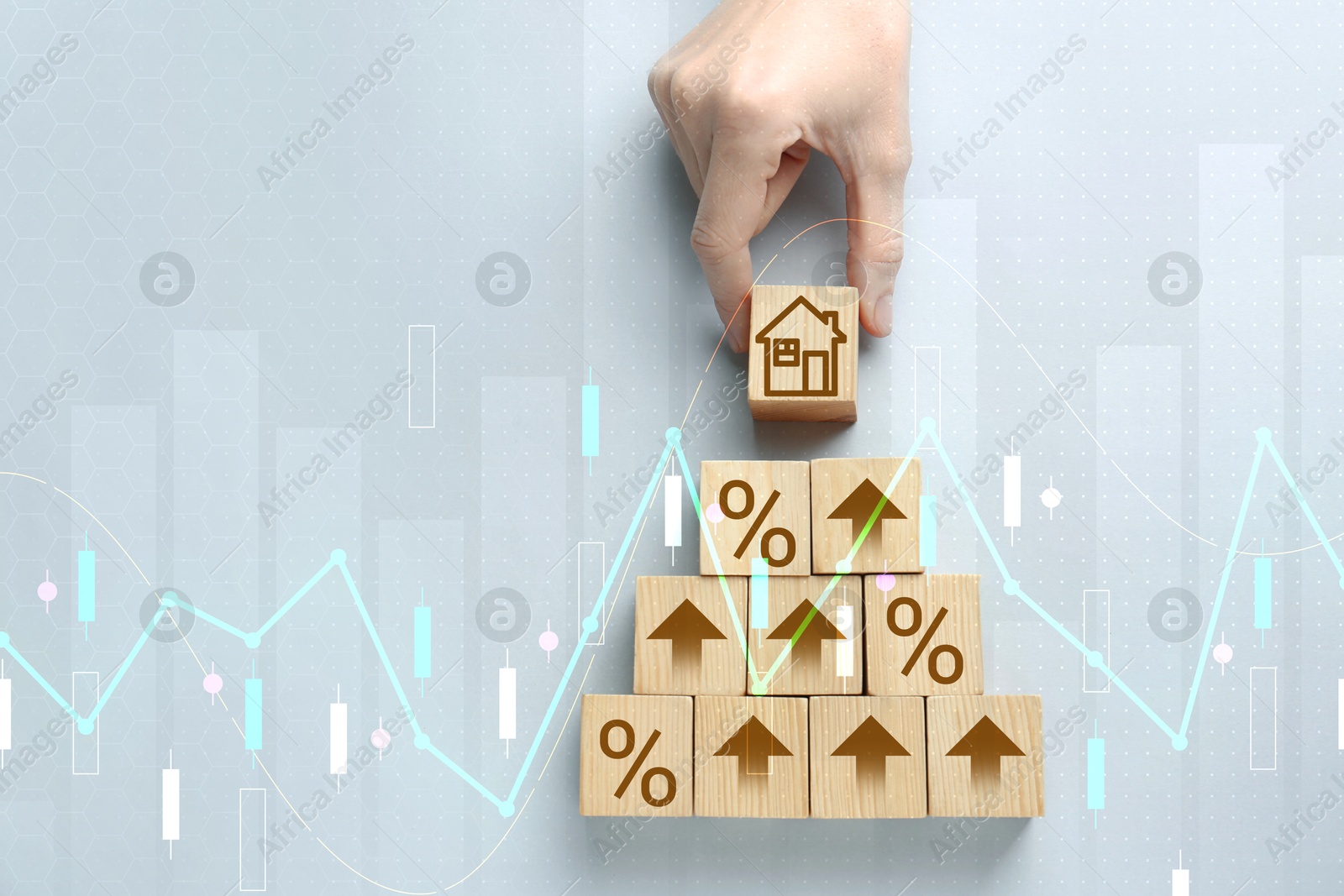 Increase in real estate value. Woman putting cube with house icon to others on grey background, top view. Percent signs and arrows on wooden cubes Image of Increase in real estate value. Woman putting cube with house icon to others on grey background, top view. Percent signs and arrows on wooden cubes