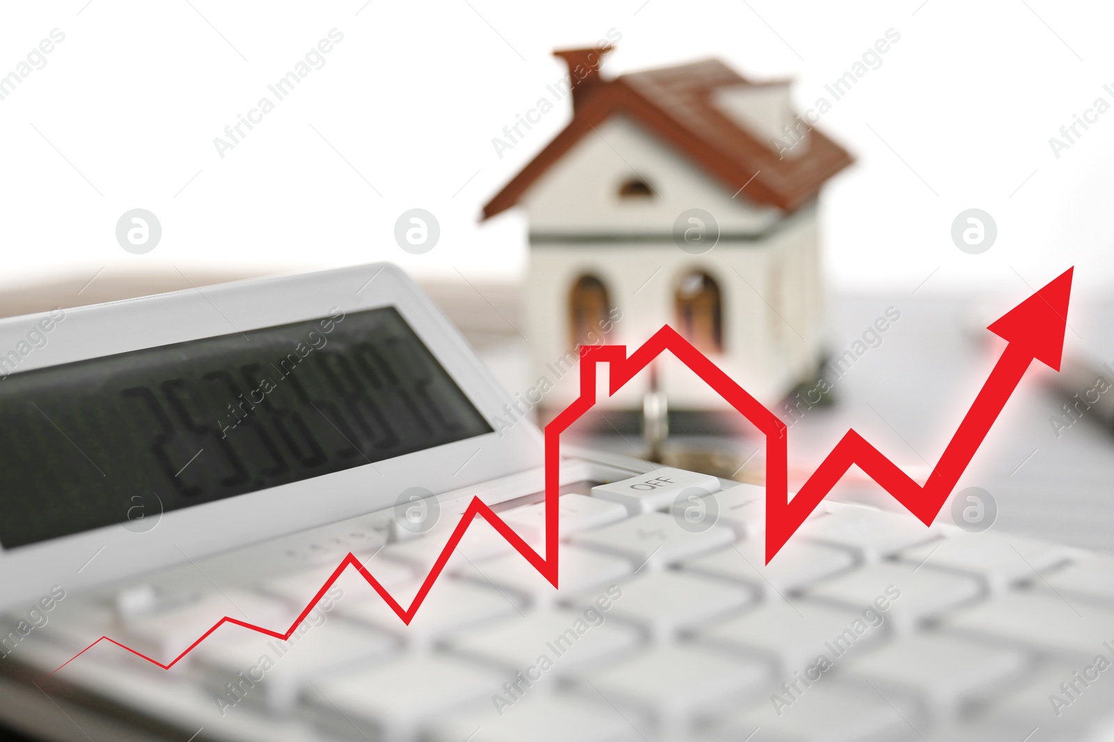 Increase in real estate value. House model and calculator on table. Growing price represented by arrow Image of Increase in real estate value. House model and calculator on table. Growing price represented by arrow