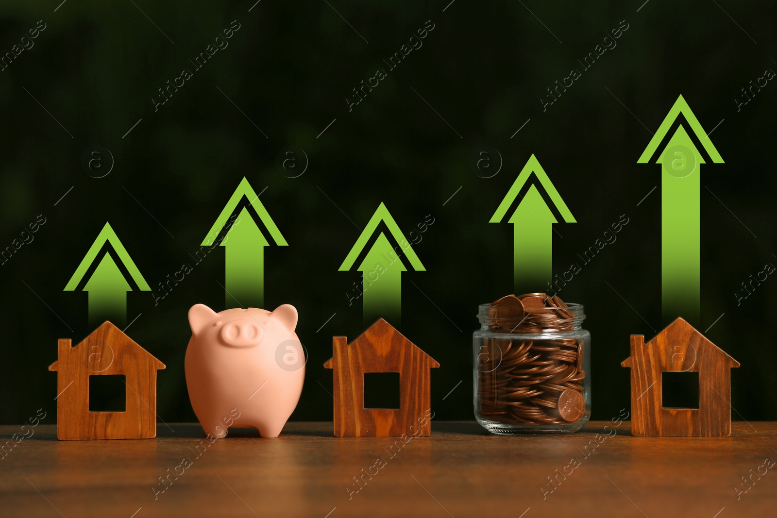Image of Increase in real estate value. House models, jar of coins and piggy bank on table. Growing price represented by arrows