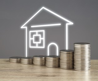 Image of Increase in real estate value. Stacked coins and illustration of house against grey background