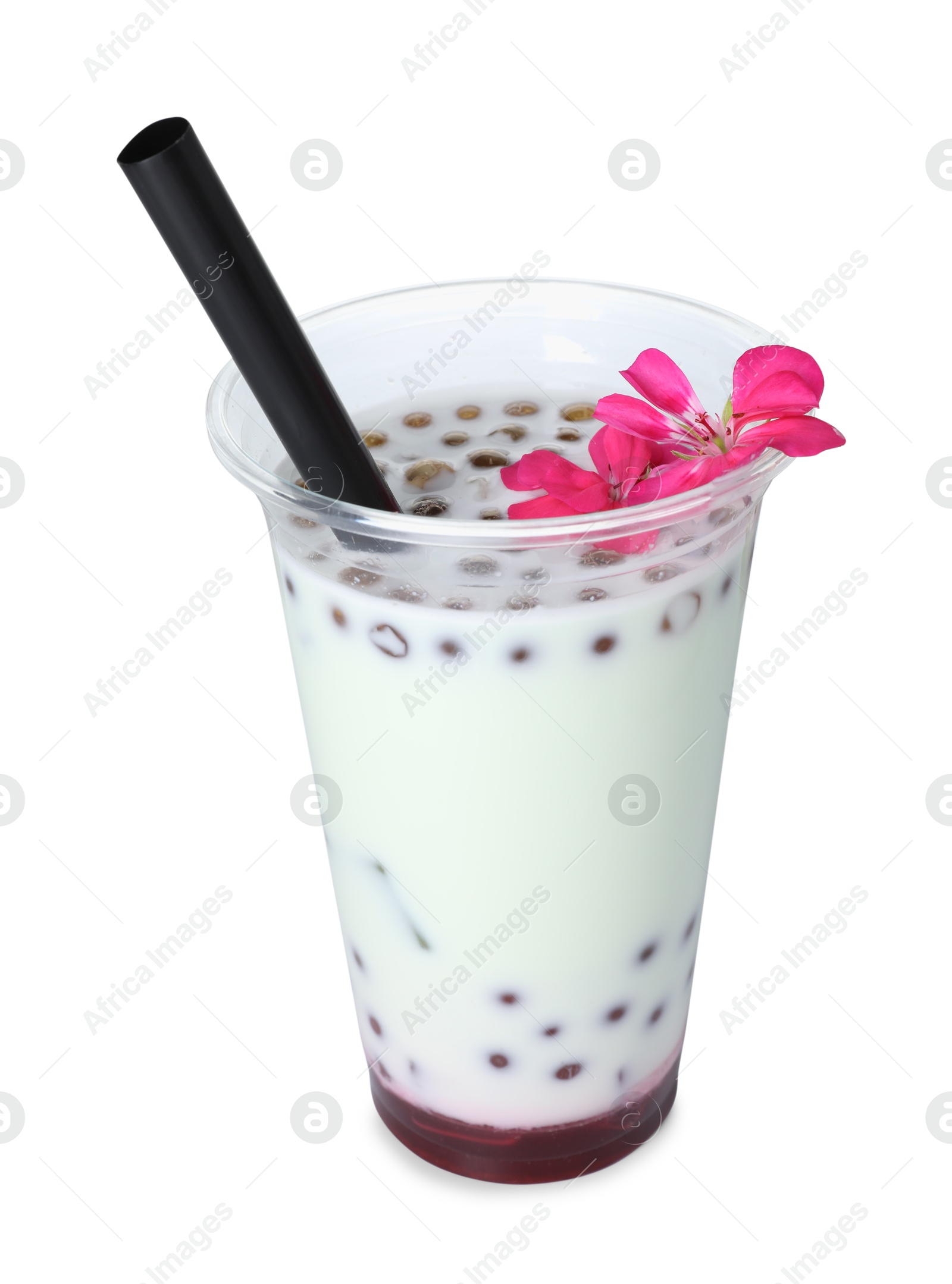 Tasty refreshing bubble tea and flower isolated on white Photo of Tasty refreshing bubble tea and flower isolated on white