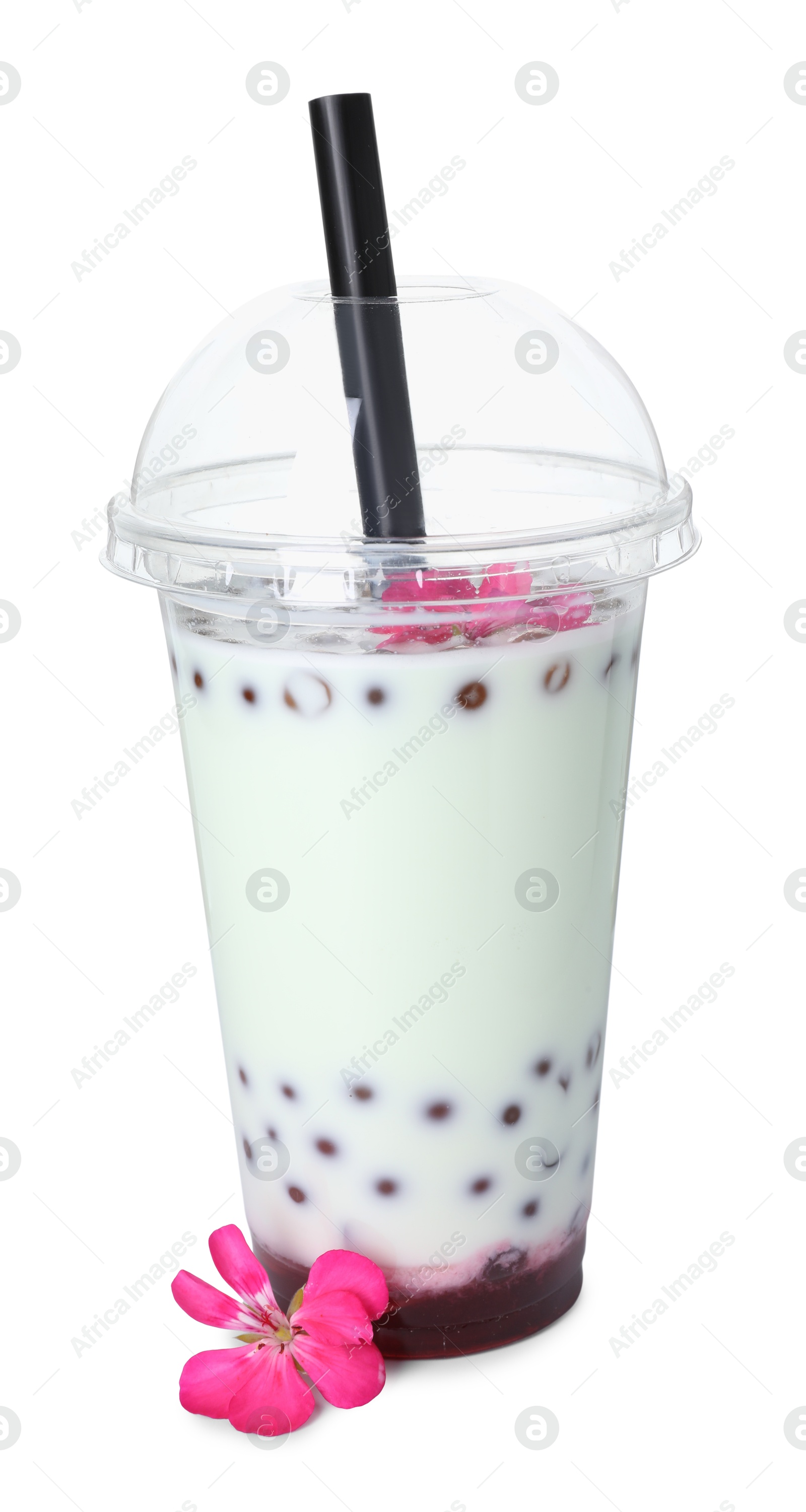 Tasty refreshing bubble tea and flower isolated on white Photo of Tasty refreshing bubble tea and flower isolated on white