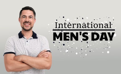 Image of International Men's Day card. Happy man on grey gradient background