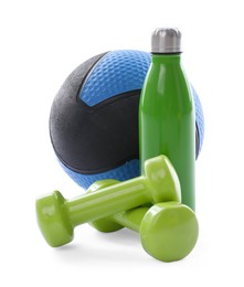 Photo of Medicine ball, dumbbells and water bottle isolated on white