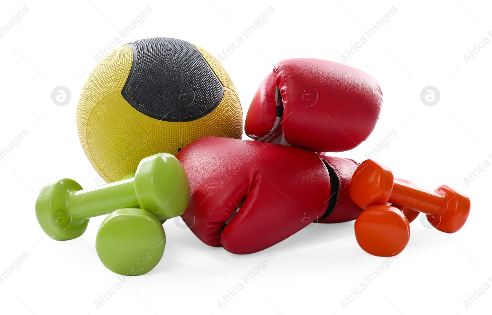Medicine ball, dumbbells and boxing gloves isolated on white Photo of Medicine ball, dumbbells and boxing gloves isolated on white