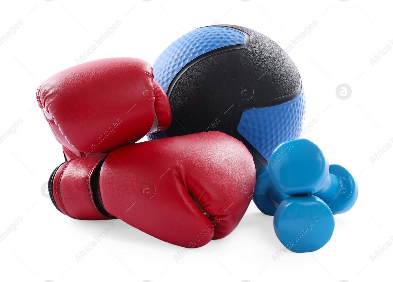 Photo of Medicine ball, dumbbells and boxing gloves isolated on white