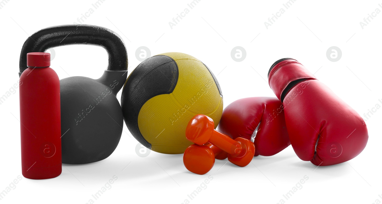 Medicine ball, kettlebell, dumbbells, boxing gloves and water bottle isolated on white Photo of Medicine ball, kettlebell, dumbbells, boxing gloves and water bottle isolated on white
