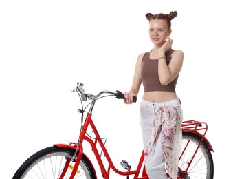 Photo of Teenage girl with red bicycle on white background