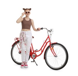 Photo of Teenage girl with red bicycle on white background
