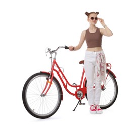 Photo of Teenage girl with red bicycle on white background