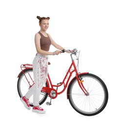 Photo of Teenage girl with red bicycle on white background