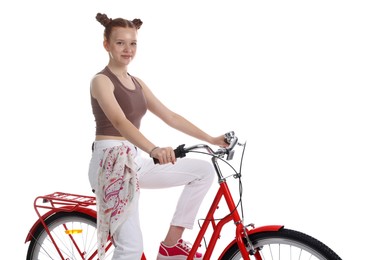 Photo of Teenage girl riding bicycle on white background