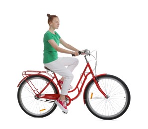 Photo of Teenage girl riding bicycle on white background