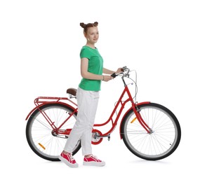 Photo of Teenage girl with red bicycle on white background