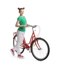 Photo of Teenage girl with red bicycle on white background