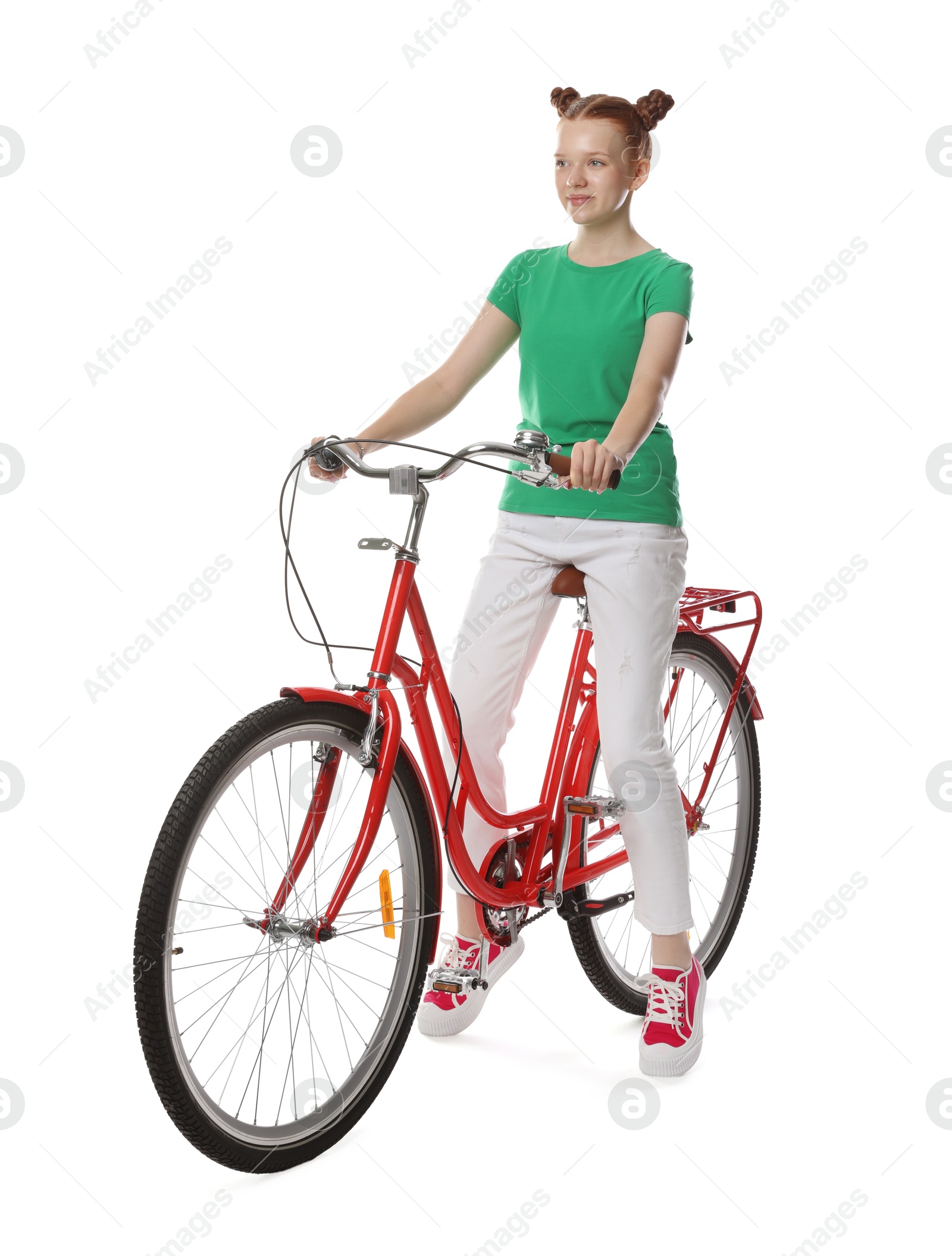 Teenage girl riding bicycle on white background Photo of Teenage girl riding bicycle on white background